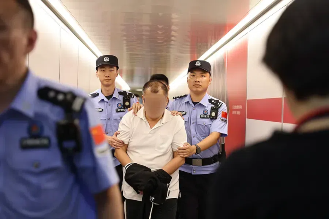 Zhang Yufa, suspected of being involved in a $14 billion pyramid scheme, was extradited from Thailand to China on Aug. 20, 2024. Photo: Courtesy of China's Ministry of Public Security